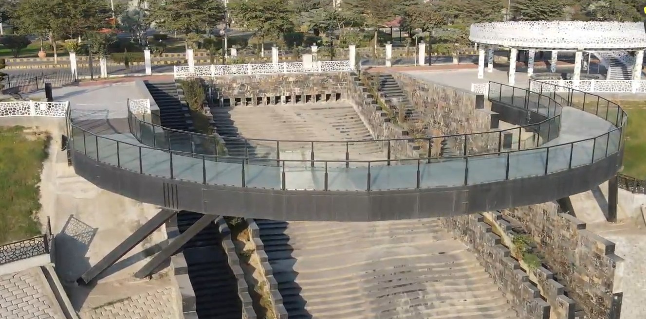 Thrilling glass bridge experience with transparent floor